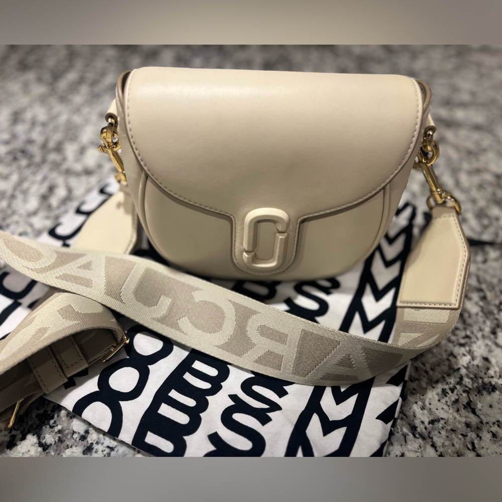 Marc Jacobs “The Covered J Marc Saddle Bag”